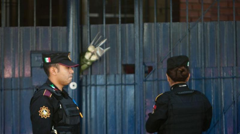 Seven bodies were found early Saturday in an abandoned taxi on the road from Manzanillo to the town of Cihuatlan. (Photo: AFP) Seven bodies were found early Saturday in an abandoned taxi on the road from Manzanillo to the town of Cihuatlan. (Photo: AFP)