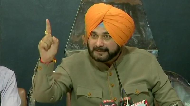 Punjab Cabinet Minister Navjot Singh Sidhu was among other personalities who had reportedly been invited by Khan to attend his oath-taking ceremony. (Photo: Twitter | ANI) Punjab Cabinet Minister Navjot Singh Sidhu was among other personalities who had reportedly been invited by Khan to attend his oath-taking ceremony. (Photo: Twitter | ANI)