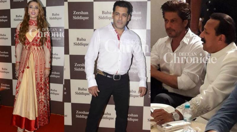 Salman Khan, Iulia Vantur and Shah Rukh Khan at Baba Siddique's Iftar party on Friday. Salman Khan, Iulia Vantur and Shah Rukh Khan at Baba Siddique's Iftar party on Friday.
