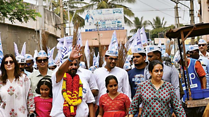 AAP candidate Prithvi Reddy arriving in a rally to file his nomination from Sarvagnanagar in Bengaluru on Thursday (Image:DC) AAP candidate Prithvi Reddy arriving in a rally to file his nomination from Sarvagnanagar in Bengaluru on Thursday (Image:DC)