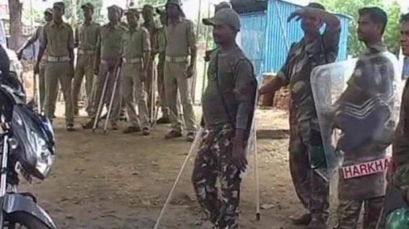 Security personnel stand guard after curfew was imposed. (Photo: Twitter | ANI) Security personnel stand guard after curfew was imposed. (Photo: Twitter | ANI)