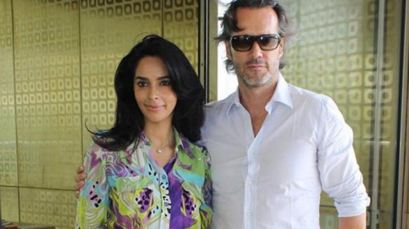 Mallika Sherawat and her French partner Cyrille Auxenfans. Mallika Sherawat and her French partner Cyrille Auxenfans.