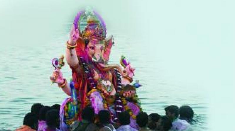 Experts warned that the pollution level would increase in the coming days as the PoP idols, which are not retrieved by the sanitation wing, would choke the oxygen level in the lakes. (Representational image) Experts warned that the pollution level would increase in the coming days as the PoP idols, which are not retrieved by the sanitation wing, would choke the oxygen level in the lakes. (Representational image)