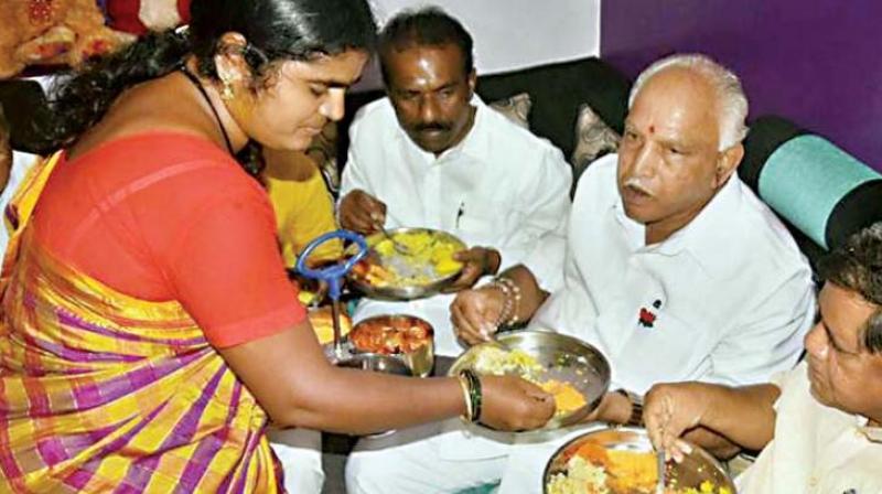 BJP started its Dalit outreach programme with state unit chief’ B.S. Yeddyurappa breaching the caste barrier by having food with several of them during his recent state-wide tour. BJP started its Dalit outreach programme with state unit chief’ B.S. Yeddyurappa breaching the caste barrier by having food with several of them during his recent state-wide tour.