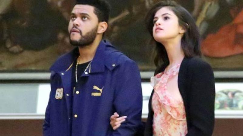 Weeknd and Selena Gomez. Weeknd and Selena Gomez.
