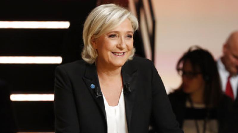 Marine Le Pen smiles prior to a television debate at French TV station TF1 in Aubervilliers, outside Paris, France, Monday, March 20, 2017. (Photo: AP) Marine Le Pen smiles prior to a television debate at French TV station TF1 in Aubervilliers, outside Paris, France, Monday, March 20, 2017. (Photo: AP)