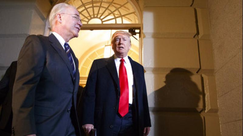 President Donald Trump and Heath and Human Services Secretary Tom Price arrive on Capitol Hill in Washington, Tuesday, March 21, 2017, for a meeting on healthcare with Republicans. (Photo: AP) President Donald Trump and Heath and Human Services Secretary Tom Price arrive on Capitol Hill in Washington, Tuesday, March 21, 2017, for a meeting on healthcare with Republicans. (Photo: AP)