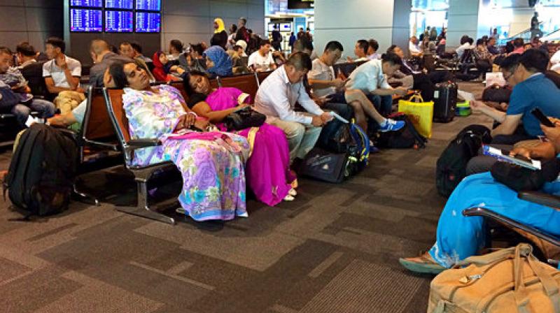 Passengers of cancelled flights wait in Hamad International Airport (HIA) in Doha, Qatar. Qatar's foreign minister says Kuwait is trying to mediate a diplomatic crisis in which Arab countries have cut diplomatic ties and moved to isolate his energy-rich, travel-hub nation from the outside world. Passengers of cancelled flights wait in Hamad International Airport (HIA) in Doha, Qatar. Qatar's foreign minister says Kuwait is trying to mediate a diplomatic crisis in which Arab countries have cut diplomatic ties and moved to isolate his energy-rich, travel-hub nation from the outside world.