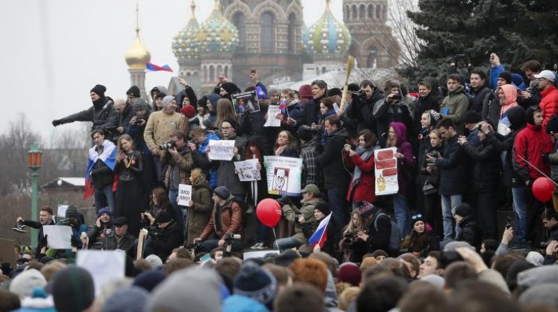 were shouting “Freedom to Navalny” after the politician himself was picked up by police on his way to the protest in the stairwell of his building. (Photo: Representational/AP) were shouting “Freedom to Navalny” after the politician himself was picked up by police on his way to the protest in the stairwell of his building. (Photo: Representational/AP)