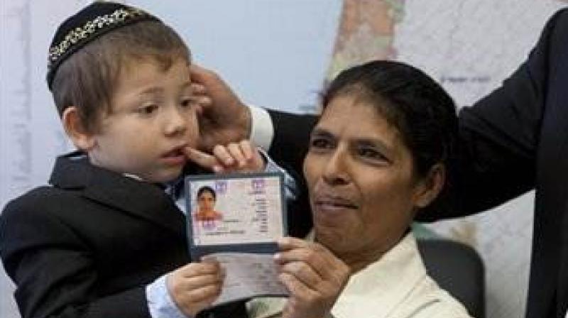 Baby Moshe with his Indian nanny Sandra Samuels. (Photo: AP) Baby Moshe with his Indian nanny Sandra Samuels. (Photo: AP)
