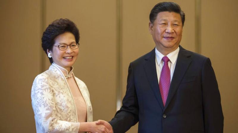 Beijing on Tuesday threw its backing behind Hong Kong leader Carrie Lam after an audio recording emerged of her saying she wanted to quit over three months of unrest in the semi-autonomous city. (Photo: File) Beijing on Tuesday threw its backing behind Hong Kong leader Carrie Lam after an audio recording emerged of her saying she wanted to quit over three months of unrest in the semi-autonomous city. (Photo: File)