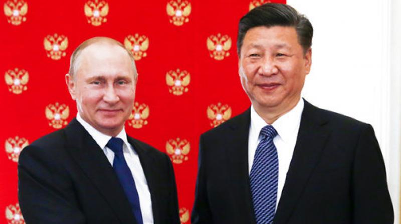 Russian President Vladimir Putin will hold talks with his Chinese counterpart Xi Jinping during an economic forum. (Photo: AP) Russian President Vladimir Putin will hold talks with his Chinese counterpart Xi Jinping during an economic forum. (Photo: AP)