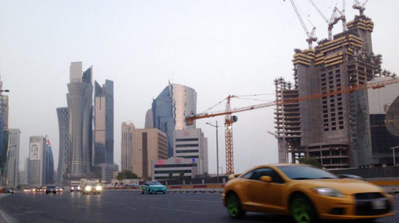Qatar had announced in September it had approved legislation to scrap the visa system -- a lynchpin of the country's "kafala", or sponsorship, system which many liken to modern-day slavery. (Representational image | AP) Qatar had announced in September it had approved legislation to scrap the visa system -- a lynchpin of the country's "kafala", or sponsorship, system which many liken to modern-day slavery. (Representational image | AP)