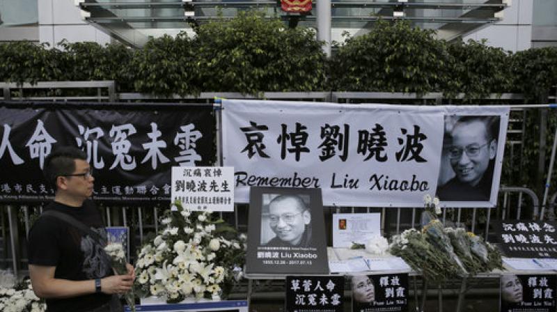 A man mourns late Chinese Nobel Peace laureate Liu Xiaobo outside the Chinese liaison office in Hong Kong. (Photo: AP) A man mourns late Chinese Nobel Peace laureate Liu Xiaobo outside the Chinese liaison office in Hong Kong. (Photo: AP)
