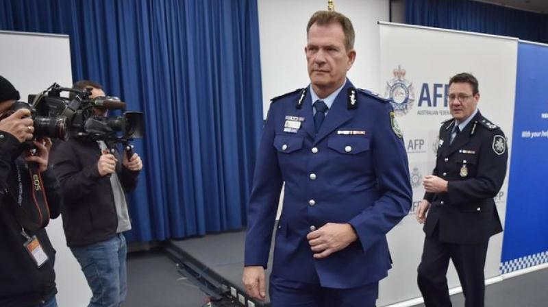 Australian Federal Police Deputy Commissioner Michael Phelan and New South Wales Police Deputy Commissioner David Hudson leave a press conference after addressing the media in Sydney. (Photo: AFP) Australian Federal Police Deputy Commissioner Michael Phelan and New South Wales Police Deputy Commissioner David Hudson leave a press conference after addressing the media in Sydney. (Photo: AFP)
