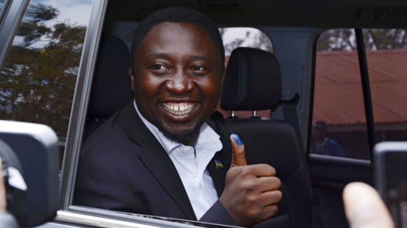 Presidential candidate Frank Habineza, of the opposition Democratic Green Party, gives the thumbs up after casting his ballot in Rwanda's capital Kigali. (Photo: AP) Presidential candidate Frank Habineza, of the opposition Democratic Green Party, gives the thumbs up after casting his ballot in Rwanda's capital Kigali. (Photo: AP)