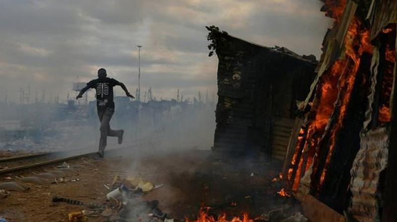 Protestors burnt a shack to the ground in a Nairobi slum as violent demonstrations against Kenya's presidential election results flared for a second day. (Photo: AFP) Protestors burnt a shack to the ground in a Nairobi slum as violent demonstrations against Kenya's presidential election results flared for a second day. (Photo: AFP)