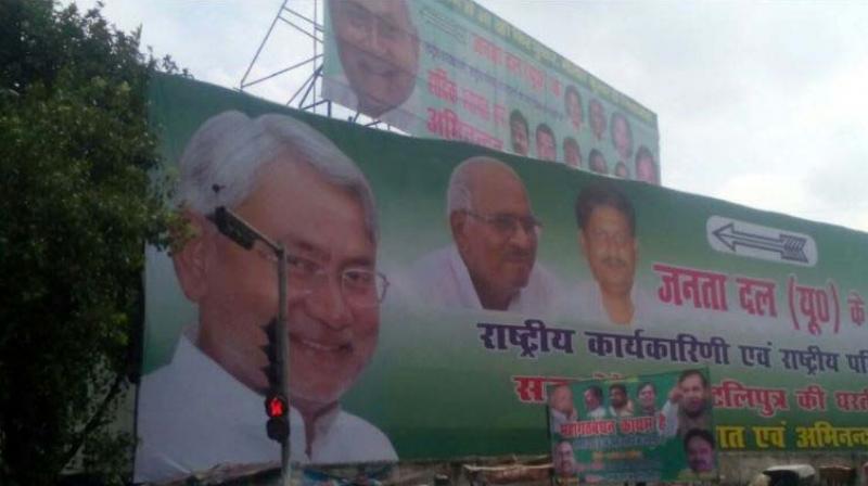 Nitish Kumar National Executive Meeting poster in Bihar (Photo: ANI) Nitish Kumar National Executive Meeting poster in Bihar (Photo: ANI)