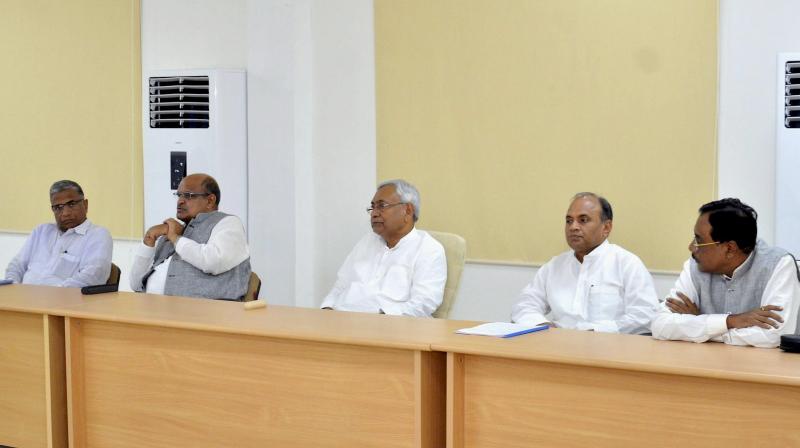 Nitish Kumar led JD(U) passes resolution to join NDA (Photo: PTI) Nitish Kumar led JD(U) passes resolution to join NDA (Photo: PTI)