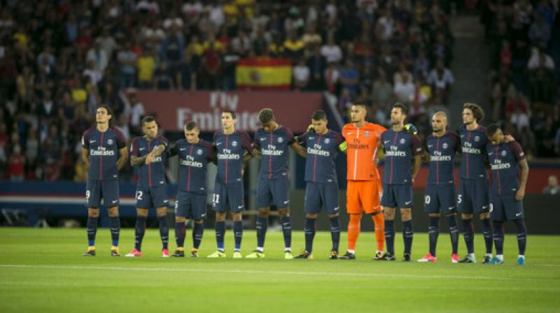 PSG's players stand for a minute of silence for the victims of the recent Spain attacks prior the French League One soccer match between PSG and Toulouse at the Parc des Princes stadium in Paris, France. (Photo: AP) PSG's players stand for a minute of silence for the victims of the recent Spain attacks prior the French League One soccer match between PSG and Toulouse at the Parc des Princes stadium in Paris, France. (Photo: AP)