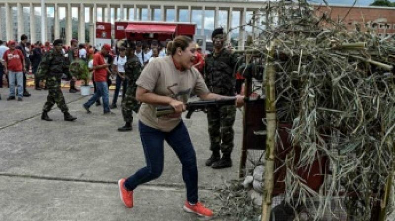 Members of the Venezuelan Army take part in military drills in Caracas. (Photo: AFP) Members of the Venezuelan Army take part in military drills in Caracas. (Photo: AFP)