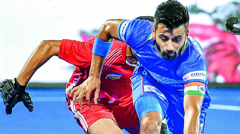 Indian captain Manpreet Singh in action against Uzbekistan during a match in the FIH Men’s Series Finals at Kalinga Stadium in Bhubaneswar. (Photo: PTI) Indian captain Manpreet Singh in action against Uzbekistan during a match in the FIH Men’s Series Finals at Kalinga Stadium in Bhubaneswar. (Photo: PTI)