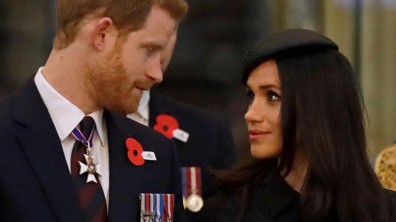 Britain's Prince Harry (L) and his US fiancee Meghan Markle attend a service of commemoration and thanksgiving to mark Anzac Day in Westminster Abbey in London on April 25, 2018. (Photo: AFP) Britain's Prince Harry (L) and his US fiancee Meghan Markle attend a service of commemoration and thanksgiving to mark Anzac Day in Westminster Abbey in London on April 25, 2018. (Photo: AFP)