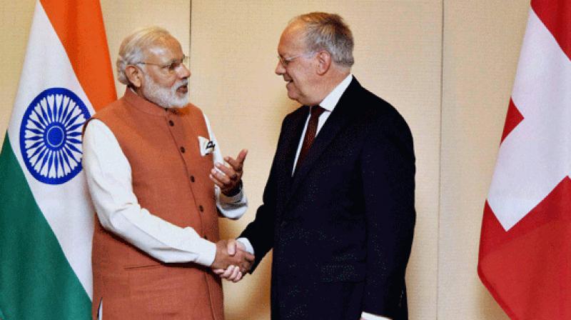 PM Modi with Swiss President Johann Schneider-Ammann. (Photo: PTI) PM Modi with Swiss President Johann Schneider-Ammann. (Photo: PTI)