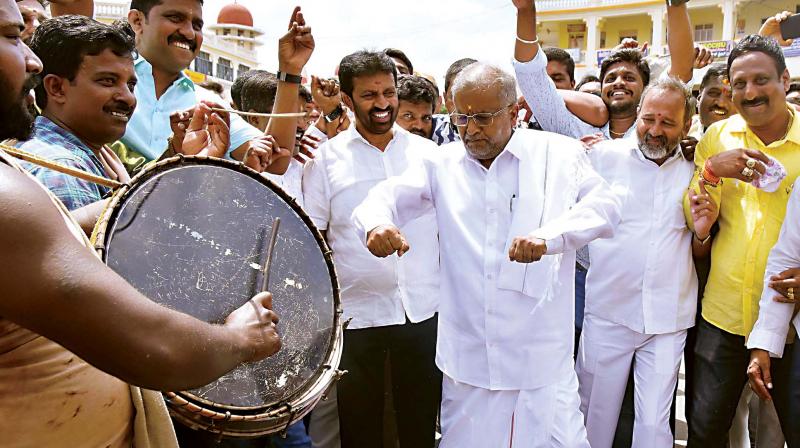G.T. Deve Gowda, the Higher Education Minister, put his gyrating skills to great use, at the Jayanthi celebration of Naada Prabhu Kempe Gowda, the architect of Bengaluru, in Mysuru on Thursday. G.T. Deve Gowda, the Higher Education Minister, put his gyrating skills to great use, at the Jayanthi celebration of Naada Prabhu Kempe Gowda, the architect of Bengaluru, in Mysuru on Thursday.
