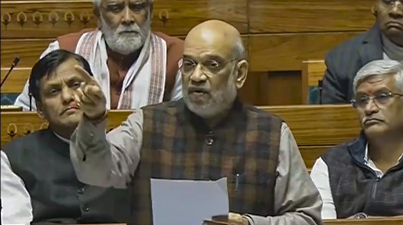 Union Home Minister Amit Shah speaks in the Lok Sabha during the Winter session of Parliament. (PTI)