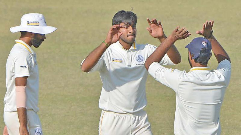 Tamil Nadu’s Vijay Shankar, who took four Mumbai wickets, celebrates a dismissal. Tamil Nadu’s Vijay Shankar, who took four Mumbai wickets, celebrates a dismissal.