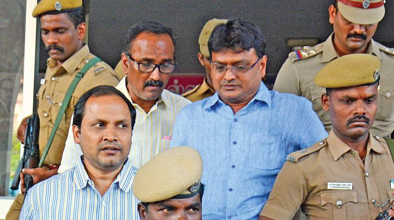 Arrested sand mining contractor J. Sekhar Reddy and his associates coming out of the XI Additional Special Court for CBI Cases, in Chennai on Tuesday. (Photo: DC) Arrested sand mining contractor J. Sekhar Reddy and his associates coming out of the XI Additional Special Court for CBI Cases, in Chennai on Tuesday. (Photo: DC)