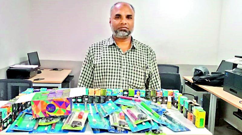 Syed Noor Arif Ali, who owned Gulnar's Perfumes at Shop No.13 in Mozamzahi Market, was caught selling Electronic Nicotine Delivery Systems that were banned by the Union government recently. Syed Noor Arif Ali, who owned Gulnar's Perfumes at Shop No.13 in Mozamzahi Market, was caught selling Electronic Nicotine Delivery Systems that were banned by the Union government recently.
