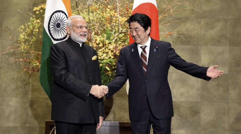 Prime Minister Narendra Modi with Japanese Prime Minister Shinzo Abe during his ceremonial welcome in Tokyo on Friday. (Photo: PTI) Prime Minister Narendra Modi with Japanese Prime Minister Shinzo Abe during his ceremonial welcome in Tokyo on Friday. (Photo: PTI)