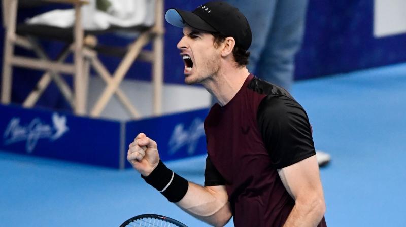 Britains Andy Murray reacts during his match against Switzerlands Stanislas Wawrinka. AFP Photo