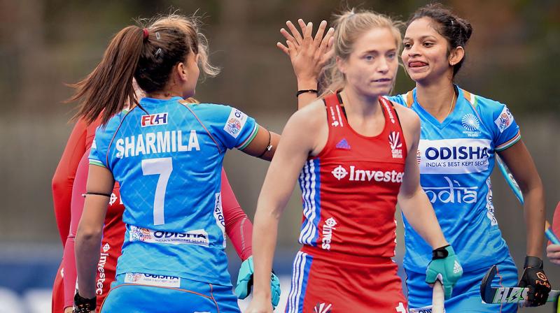 Sharmila Devi congratulates Navjot Kaur (R) after the latter scored a goal against the British team on the tour of England last year. PTI Photo Sharmila Devi congratulates Navjot Kaur (R) after the latter scored a goal against the British team on the tour of England last year. PTI Photo