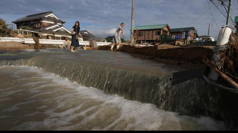 Flood make it dangerous to live in some cities of Japan. (Photo: AFP) Flood make it dangerous to live in some cities of Japan. (Photo: AFP)