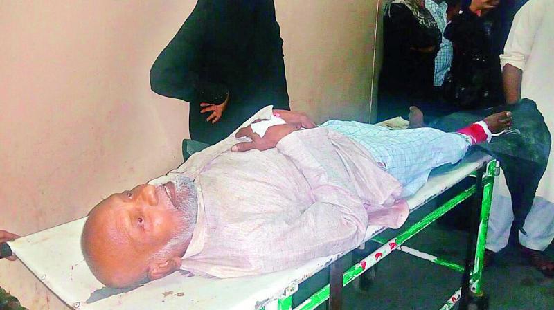 Ninety-five-year old retired IDPL employee Mohammed Omar being taken on a stretcher after a car hit five outpatients on OG’s premises. (Photo: DC) Ninety-five-year old retired IDPL employee Mohammed Omar being taken on a stretcher after a car hit five outpatients on OG’s premises. (Photo: DC)
