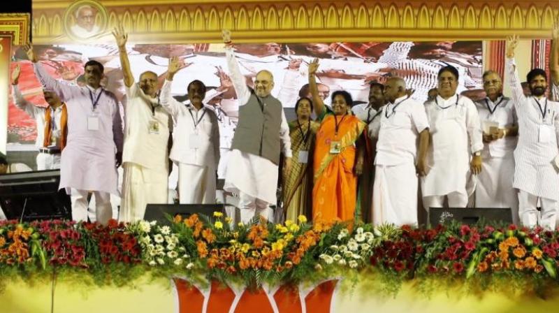 The BJP chief, who met party leaders and workers during the day to galvanise the party apparatus before the Lok Sabha polls, said a conference of 1.25 lakh booth-level functionaries will be held in October which will be attended by Prime Minister Narendra Modi. (Photo: Twitter | Amit Shah) The BJP chief, who met party leaders and workers during the day to galvanise the party apparatus before the Lok Sabha polls, said a conference of 1.25 lakh booth-level functionaries will be held in October which will be attended by Prime Minister Narendra Modi. (Photo: Twitter | Amit Shah)