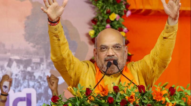In the home ministry, Amit Shah does for Mr Modi what he did for him in Gujarat. Mr Shah was minister of state for home (not given a Cabinet rank) for about a decade in Gujarat, reporting to Mr Modi. He now becomes the default number two person in the government. (Photo: AP) In the home ministry, Amit Shah does for Mr Modi what he did for him in Gujarat. Mr Shah was minister of state for home (not given a Cabinet rank) for about a decade in Gujarat, reporting to Mr Modi. He now becomes the default number two person in the government. (Photo: AP)