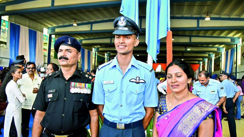 Flying Officer Gajulapalli Navin Kumar Reddy with his father Pulla Reddy and mother Soujanya Flying Officer Gajulapalli Navin Kumar Reddy with his father Pulla Reddy and mother Soujanya