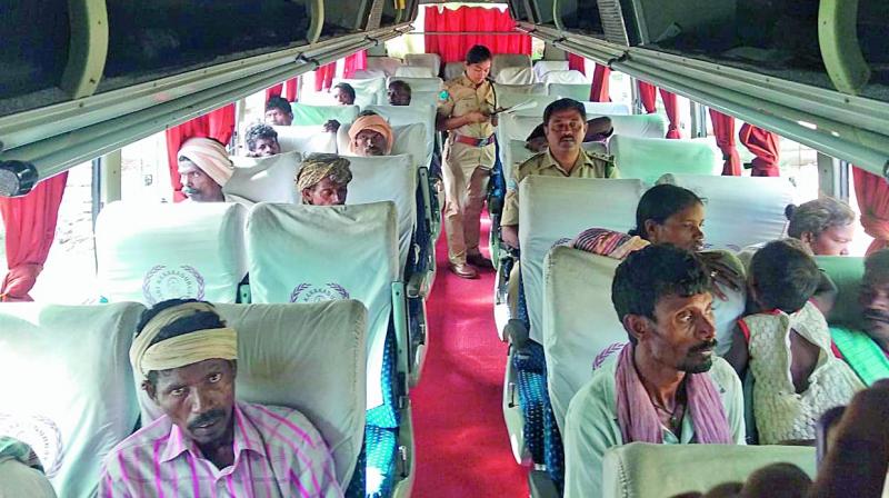 Tribals sit in an AC bus organised by forest department following a High Court order to produce them before the two-judge bench in Hyderabad. (Photo: DC) Tribals sit in an AC bus organised by forest department following a High Court order to produce them before the two-judge bench in Hyderabad. (Photo: DC)