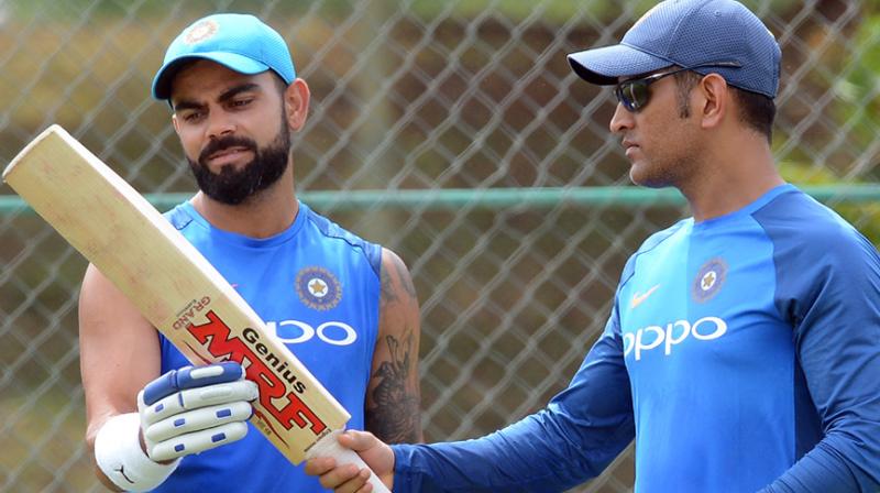 When an astute brain meets a superlative performer, there is bound to be lot of mutual admiration and the Kohli-Dhoni relationship is no different. (Photo: AFP / File) When an astute brain meets a superlative performer, there is bound to be lot of mutual admiration and the Kohli-Dhoni relationship is no different. (Photo: AFP / File)