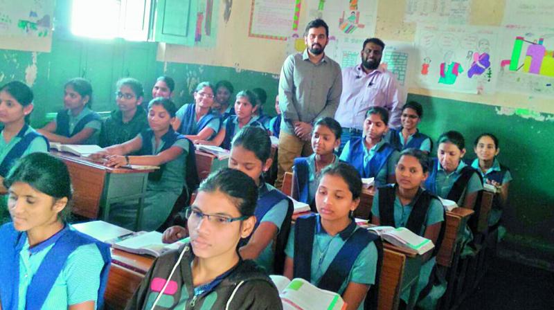 Members of Startup Egnify interact with students at a government school as part of their pilot project. Members of Startup Egnify interact with students at a government school as part of their pilot project.