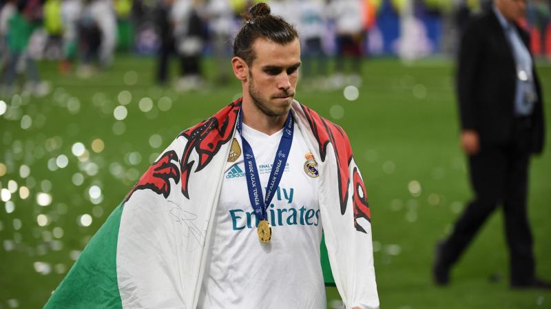 Bale has four Champions League winners' medal from five seasons in Spain, equalling the British record of former Liverpool defender Phil Neal.. (Photo: AFP) Bale has four Champions League winners' medal from five seasons in Spain, equalling the British record of former Liverpool defender Phil Neal.. (Photo: AFP)