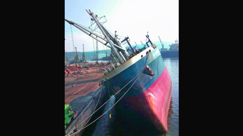A foreign vessel tilted to one side at the EQ berth No. 5 at Visakhapatnam Port Trust in Visakhapatnam on Wednesday. A foreign vessel tilted to one side at the EQ berth No. 5 at Visakhapatnam Port Trust in Visakhapatnam on Wednesday.