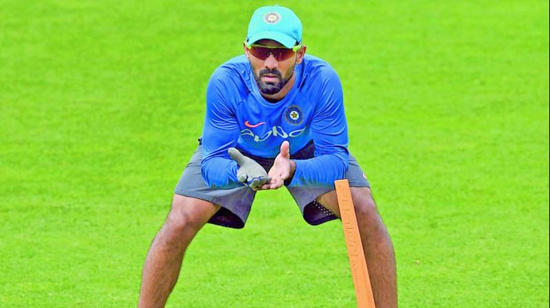 Dinesh Karthik in action during the training session. Dinesh Karthik in action during the training session.