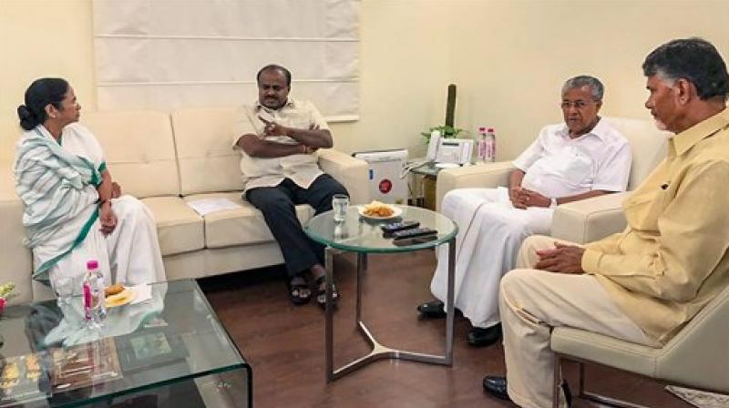 (L-R) West Bengal Chief Minister Mamata Banerjee, Karnataka CM H D Kumaraswamy, Kerela CM Pinarayi Vijayan and Andhra Pradesh CM N Chandrababu Naidu during a meeting at Andhra Bhawan, in New Delhi on Saturday. (Photo: PTI) (L-R) West Bengal Chief Minister Mamata Banerjee, Karnataka CM H D Kumaraswamy, Kerela CM Pinarayi Vijayan and Andhra Pradesh CM N Chandrababu Naidu during a meeting at Andhra Bhawan, in New Delhi on Saturday. (Photo: PTI)