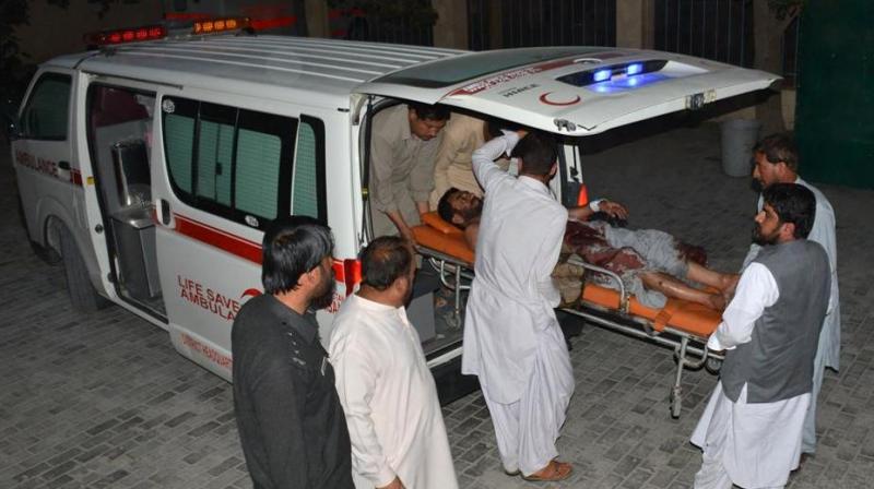 Pakistani men shift an injured victim into a hospital in Quetta. (Photo: AFP) Pakistani men shift an injured victim into a hospital in Quetta. (Photo: AFP)