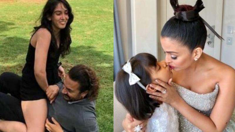 Photograph shared by Aamir Khan on Facebook, where he can be seen with his daughter Ira. Aishwarya Rai Bachchan with Aaradhya. Photograph shared by Aamir Khan on Facebook, where he can be seen with his daughter Ira. Aishwarya Rai Bachchan with Aaradhya.
